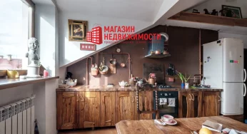 Недвижимость недели: в Гродно продается атмосферная квартира в мансарде с видом на три костела